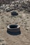 abandoned tires polluting dry land due to drought in europe