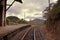 Abandoned train station in rainy weather