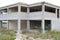 abandoned unfinished cottages made of concrete and brick.