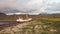 Abandoned vessel stranded on a beach on the Icelandic coast