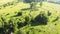 Abandoned village and destroyed wooden houses from aerial view . Summer is the middle lane of Russia