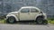 Abandoned Volkswagen Beetle side shot