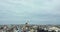 Abandoned waste dump with flying storks on cloudy sky horizon