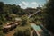 abandoned waterpark, with broken and rusted slides and pool, surrounded by overgrown greenery