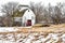 Abandoned White Barn in Winter