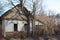 Abandoned wooden house in a dead village in the Chernobyl exclusion zone