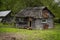 abandoned wooden old house, abandoned houses ruin after the crisis, desolation and ruin