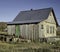 Abandoned wooden old rural house. Deserted country village, desolation and ruin