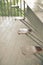 abandoned wooden porch with fall leaves on the floor