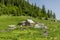 Abandoned wooden sheepfold in Carpathians near the mountain range