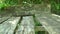 Abandoned wooden table with bench in mountain