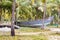 Abandonned artistic wooden canoe on a lonely beach