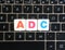 Abbreviation ADC on keyboard background