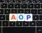 Abbreviation AOP on keyboard background