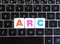 Abbreviation ARC on keyboard background