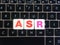 Abbreviation ASR on keyboard background
