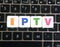 Abbreviation IPTV on keyboard background