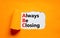 ABC always be closing symbol. Concept words ABC always be closing on white paper on a beautiful orange background. Business and