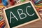 ABC simple alphabet written on a blackboard, reading writing concept