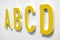 ABCD yellow alphabet letters