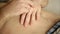 Abdominal palpation examination in medical centre. doctor\'s hand on patient stomach