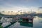 Abel Point Marina in Airlie Beach with yachts on berth and helipot