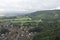 Abergele village, town surrounded by countryside with mountainous background, north Wales British Village, clouds and forest