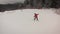 Abetone, Italy, 23th January 2017 - A little girl with go pro on her helmet taking her first ski lesson with her teacher, HD