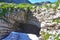 Abkhazia, Arabica plateau, mount Arabica and the entrance to one of the caves in sunny summer day