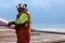 Able seaman working on deck during offshore rig move operation wearing safety equipment