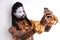 aborigen tribal man of african appearance take photo on smartphone