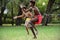 Aboriginal Australians men dancing traditional dance during Australia Day celebrations