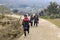 Aboriginal people of the mountains of Sapa, in north Vietnam, dressed with their traditional attire and walking in their village