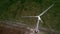 Above aerial view of wind turbines in action making electricity