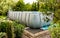 Above ground, rack swimming pool in the garden. Summer holiday recreation