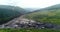 From above Open pit mine, breed sorting, mining coal, extractive industry. Top view coal falling from the moving belt