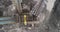 From above Open pit mine, breed sorting, mining coal, extractive industry. Top view coal falling from the moving belt