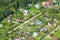 Above view of cottages in suburb village in summer