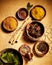 Above view on pots of herbs for Indian cuisine