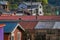 Above view of rooftop of colorful houses in the horizont located in Castro, Chiloe Island