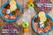Above view of table with two dishes full of vegetables and diet healthy food on a wooden trendy table -coloured mix of tasty and