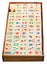 Above view of wood mahjong game tiles in box