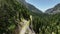 Above the Wilderness: Aerial Perspective of the Serene Spring Forest and Hiking Ventures