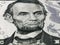 Abraham Lincoln portrait macro on 5 dollars money usa american banknote