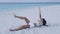 Abs exercise fitness woman - fit sporty girl doing Starfish Crunches on beach
