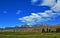 Absaroka Mountain Range under summer cirrus and lenticular clouds near Dubois Wyoming