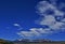 Absaroka Mountain Range under summer cirrus and lenticular clouds near Dubois Wyoming