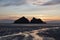 Absolutely beautiful landscape images of Holywell Bay beach in Cornwall UK during golden hojur sunset in Spring