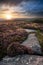 Absolutely beautiful sunset landscape image looking from Higger Tor in Peak District across to Hope Vally in late Summer with