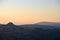 Absolutely stunning landscape image of Dartmoor in England showing Leather Tor and Kings Tor in majestic sunrise light